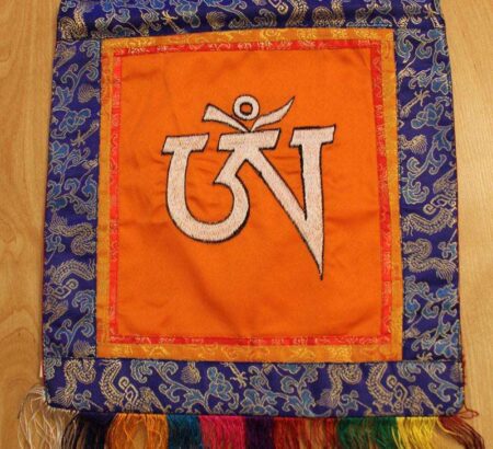 OM symbol wall hanging (white on orange)